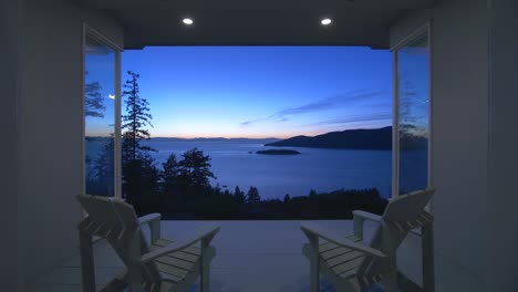 Two-chairs-looking-over-a-beautiful-sunset-view-in-Vancouver,-British-Columbia,-Canada