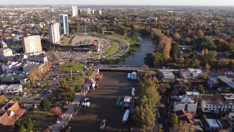 Tigre-residential-area-in-Buenos-Aires-province-with-cityscape-and-Parana-river-and-cars-crossing-bridge,-Argentina