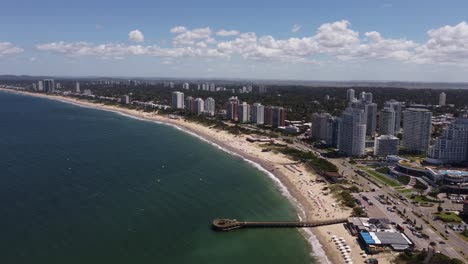 Aerial-panoramic-shot-of-Playa-Mansa-in-Punta-del-Este-in-Uruguay-during-sunny-day---Modern-Skyscraper-Towers-in-City