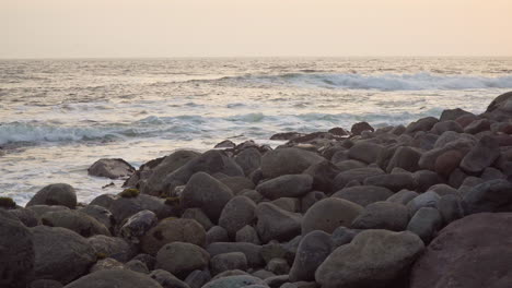 Static-shot-of-a-rocky-beach-along-the-coast-of-San-Bartolo,-Lima,-Peru