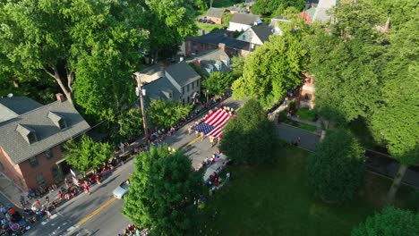 USA-flag-being-carried-in-parade