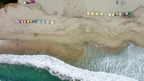 Seashore-Coast-Front-Beach-Paradise-Aerial-Drone-Fly-Above-Sand-Umbrella-Seaside