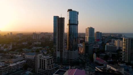Dar-es-Salaam---Tanzania---June-16,-2022---Cityscape-of-Dar-es-Salaam-at-sunset-featuring-residential-and-office-buildings