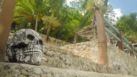 Mexican-sculpted-skulls-on-stairs