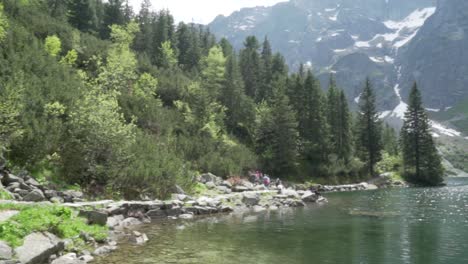 Slow-motion-pan-shot-of-the-lake-of-Morskie-Oko-on-a-bright-day-on-summer