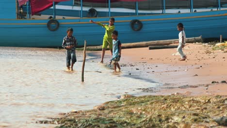 Khmer-Children-Playing-on-the-River-Shore-of-the-Tonle-Sap-Lake
