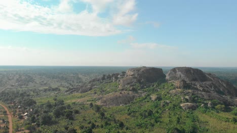 Aerial-shot-orbiting-around-large-granite-boulders-on-the-beautiful-landscape-of-East-Africa