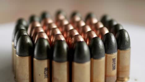 Close-up-of-many-ammunition-are-arranged-in-a-row-and-rotated-with-a-rotating-platform