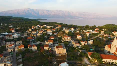 Moving-aerial-drone-shot-of-the-town-Selca-Island-Brac-Croatia-Europe