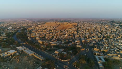 Drone-aerial-dolly-in-shot-of-jaisalmer-city,-Rajasthan,-India
