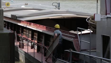 A-cargo-ship-filled-with-fertilizer-on-a-river-in-Münster-at-a-sunny-day