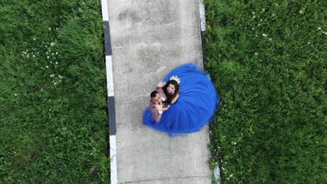 newlyweds-waveing-to-drone-camera-while-it-is-going-up