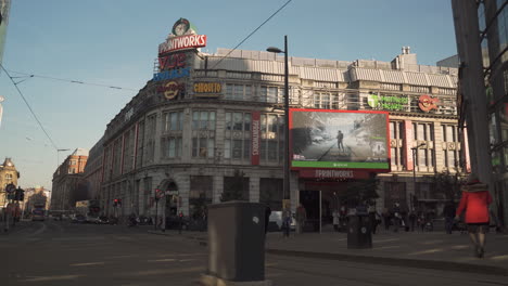 People-walking-past-Printworks-in-Manchester-City,-UK