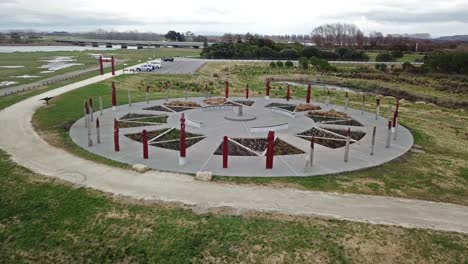 Aerial-pan,-view-of-the-compass-central-stone-by-the-Maori-in-Napier,-New-Zealand