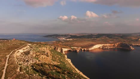 Aerial-drone-video-from-Malta,-Mellieha-area,-showing-the-beautiful-landscape-on-a-calm-autumn-afternoon