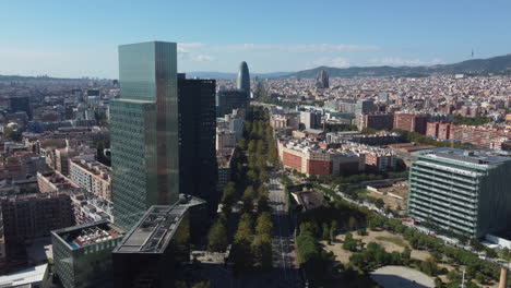 Drone-shot-of-Barcelona-city-center---drone-is-flying-along-Av