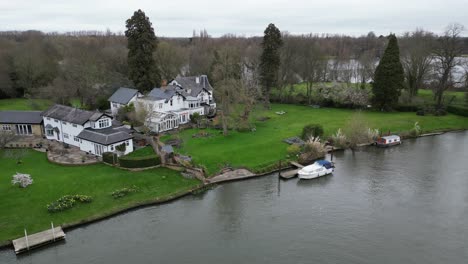 Large-house-river-Thames-Walton-on-Thames-Drone,-Aerial,-view-from-air,-birds-eye-view