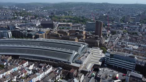 Aerial-View-of-Brighton-Railway-Station-revealing-City-and-Downs-on-a-Sunny-day