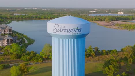 A-high-angle-view-over-water-towers-in-a-Sarasota,-Florida-during-sunset