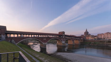 Ponte-Coperto-in-Pavia-at-sunset-and-evening,-Lombardy,-italy