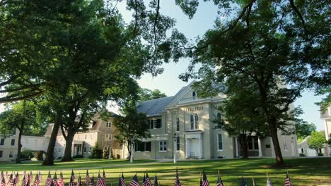 Separation-of-church-and-state-theme,-Linden-Hall-and-Moravian-Church-yard-filled-with-patriotic-American-flags