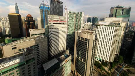 Tilt-up-shot-of-the-downtown-of-Kuala-Lumpur-with-many-skyscrapers