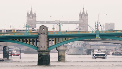 Southwark-and-Tower-Bridges-in-rainy-weather,-London,-United-Kingdom