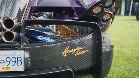 Arc-Shot-Revealing-the-Rear-End-of-a-Purple-Pagani-Huayra-at-Car-Show