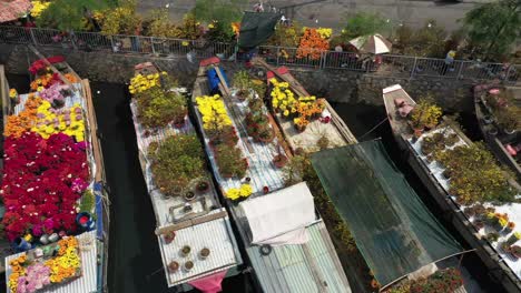 Tracking-Aerial-view-of-floating-flower-market-in-Saigon-or-Ho-Chi-Minh-City-in-Vietnam