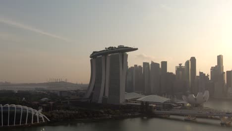 Aerial-Footage-of-Singapore-Cityscape-featuring-famous-tourist-attractions-in-Marina-Bay