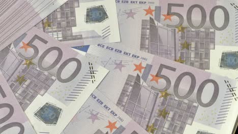 Many-five-hundred-euro-notes-rotating-in-circle,close-up-shot