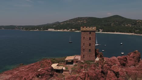 Aerial-view-of-the-beautiful-island-of-L'ile-d'Or-in-France-on-a-calm-sunny-day