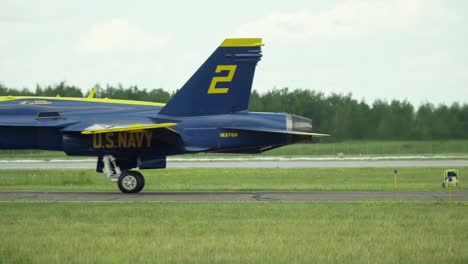 Boeing-F-A-18-Hornets-taxiing-across-a-runway-in-single-file