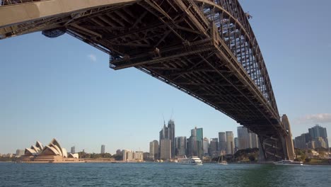 Beautiful-panning-and-close-up-shot-of-the-Sydney-Harbour-Bridge-below-the-bridge-on-Sunset