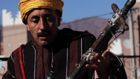 Closeup-of-rabab-musician-playing-bowed-instrument-with