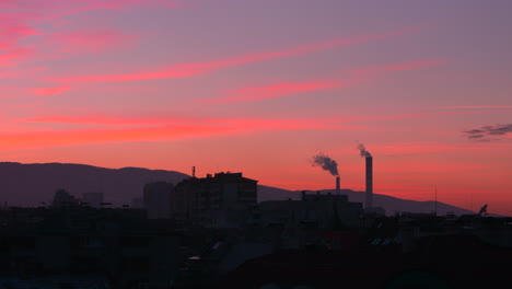 Purple-sunset-over-chimneys-in-Sofia,-Bulgaria