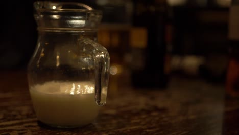 Jug-of-milk-in-cafe-medium-zoom-out-shot