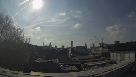 Rooftop-Time-Lapse-Over-Farringdon-During-Sunrise-With-Dramatic-Cloudscapes