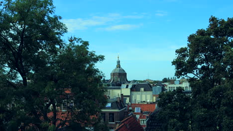 Timelapse-shot-of-Leiden-City-during-beautiful-summer-day-and-old-Marekerk-Church-in-background