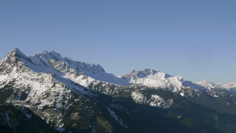 Rocky-Mountain-Ranges-With-Snow-Covered-Peaks-In-Canada-During-Winter