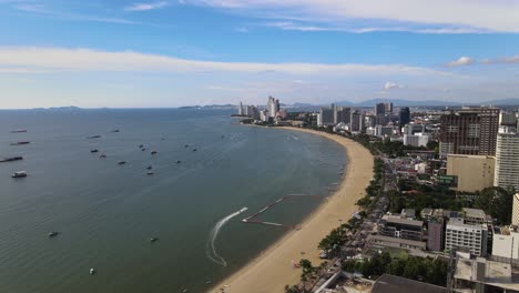 Aerial-view-approaching-Pattaya-beach,-wide-angle