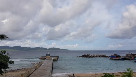Cemented-boat-pier-below-thick-clouds-in-Batanes,-Philippines