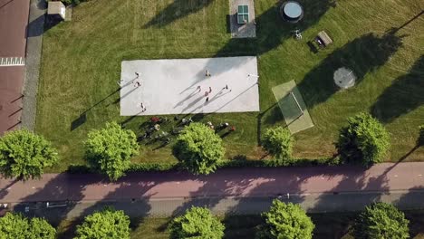 Drone-view-of-a-park-with-a-playground-in-Dronten,-Flevoland,-The-Netherlands