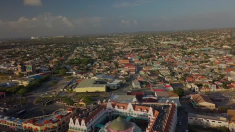 Aerial-view-of-the-houses-in-the-city-Oranjestad-of-Aruba-with-blue-skies