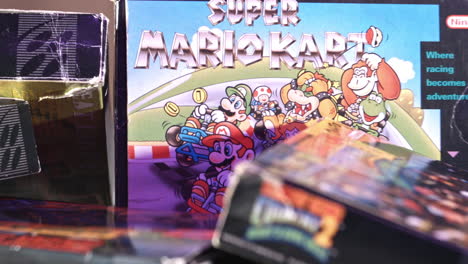 Caja-De-Kart-De-Super-Mario-Vintage-Con-Otros-Juegos-Alrededor-En-Luz-Púrpura-Desliza-Hacia-La-Derecha