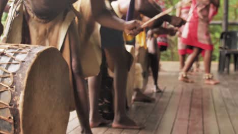 swazi-dancers-performing-traditional-dancing-with-men-beating-large-drums-in-swaziland