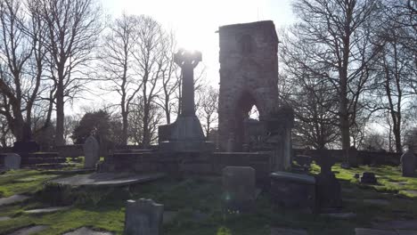 Pull-back-view-across-ruin-remains-in-St-Helens-Chantry-cemetery-grounds