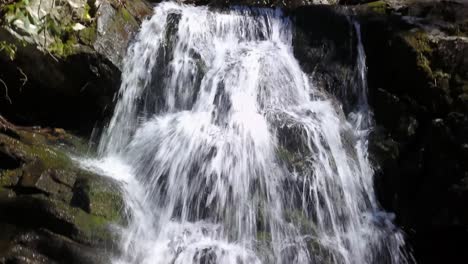 Aerial-pan-down-of-waterfall-in-Appalachian-Mountains