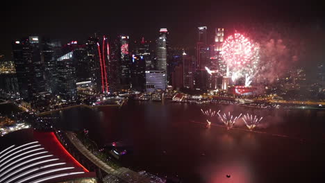 Singapore---Circa-Colorful-Celebration-Fireworks-In-Singapore-City-Bay-Area-with-City-Lights-Towers-Skyscapers-and-Reflections-on-Sea