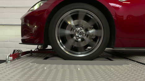 Close-ups-from-a-car-on-a-rolling-road-or-dynamometer